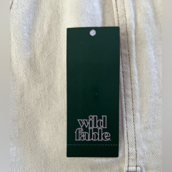 NWT Wild Fable Women's Scoop Neck Reworked Denim
Tiny Vest - Cream XL.  Target - Picture 3 of 9